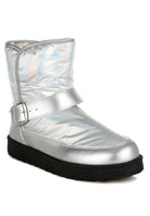 Rag Company silver buckle strap boots featuring a shiny metallic design and soft lining for comfort