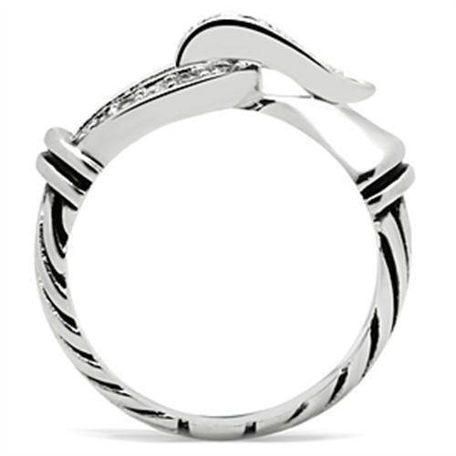Elegant silver knot engagement ring featuring a unique twisted band design and sparkling accents