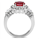 Elegant silver ring with red gemstone and sparkling accents for formal occasions