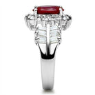 Elegant sterling silver ring with red gemstone and sparkling accents, perfect for any occasion
