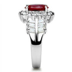 Elegant sterling silver ring with red gemstone and sparkling accents, perfect for any occasion