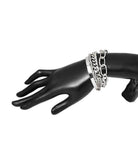 Silver thick bangle set displayed on a black hand mannequin for stylish women's jewelry