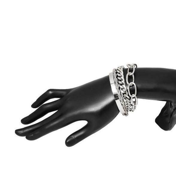 Silver thick bangle set displayed on a black hand mannequin for stylish women's jewelry