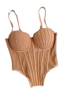 Brown sexy bustier camisole for ladies with structured cups and adjustable straps laid on black surface