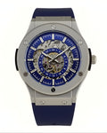 Dapper men's skeleton watch with blue dial and silicone strap