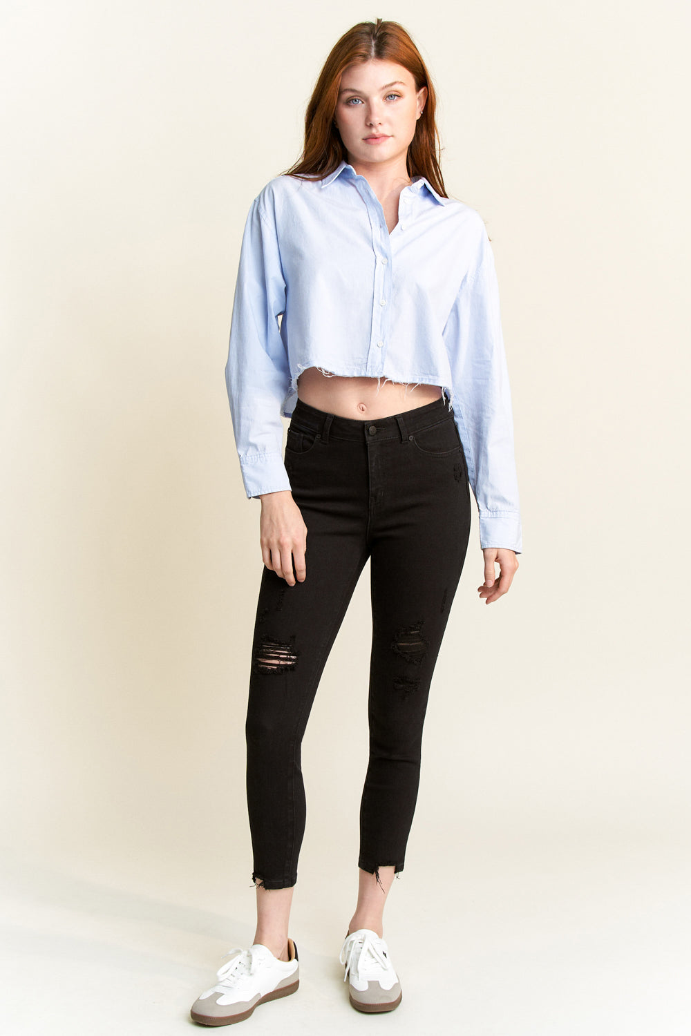 Women's black skinny pants jeans with ripped details for casual wear