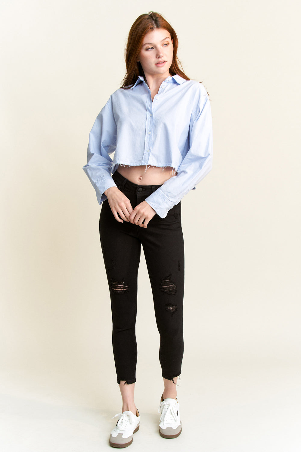 Women's black skinny pants jeans with distressed details for casual wear