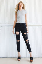 Women's black skinny pants jeans with distressed rips for casual wear
