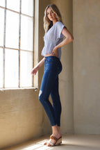 Women's blue skinny pants jeans with distressed details and comfortable fit