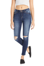 Women's distressed skinny pants jeans in dark blue denim, casual style