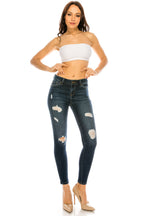 Women's ripped dark blue skinny pants jeans, perfect for casual outings