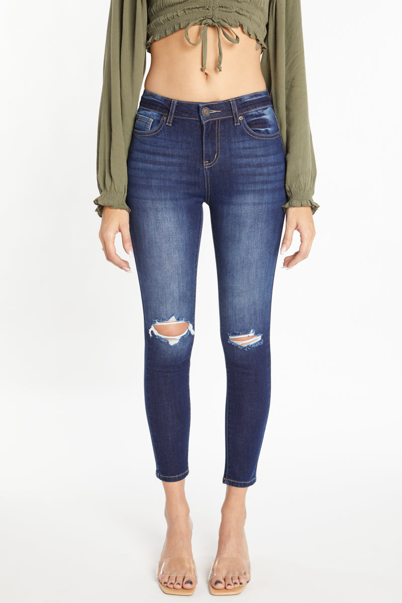 Women's dark blue skinny pants jeans with distressed knees, stylish fit