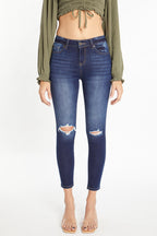 Women's dark blue skinny pants jeans with distressed knees, stylish fit