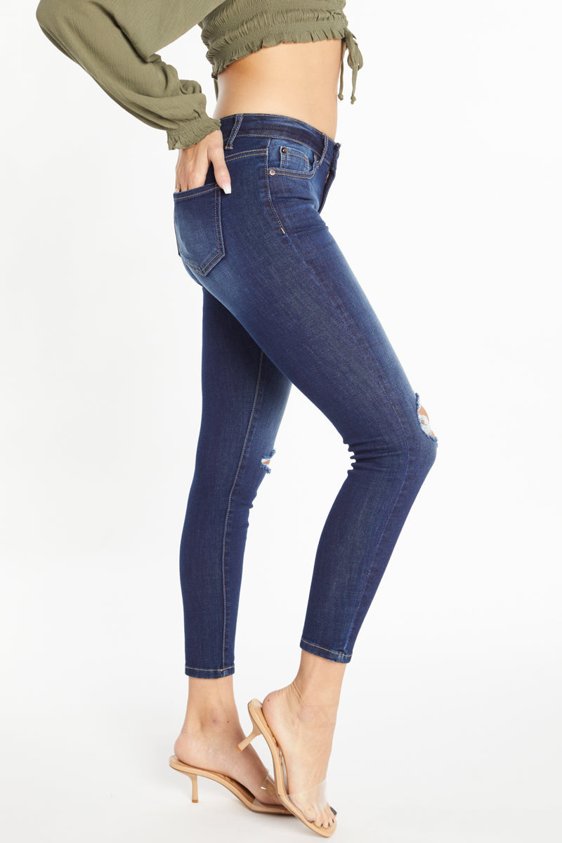 Women's blue denim skinny pants jeans with ripped detailing for casual outings