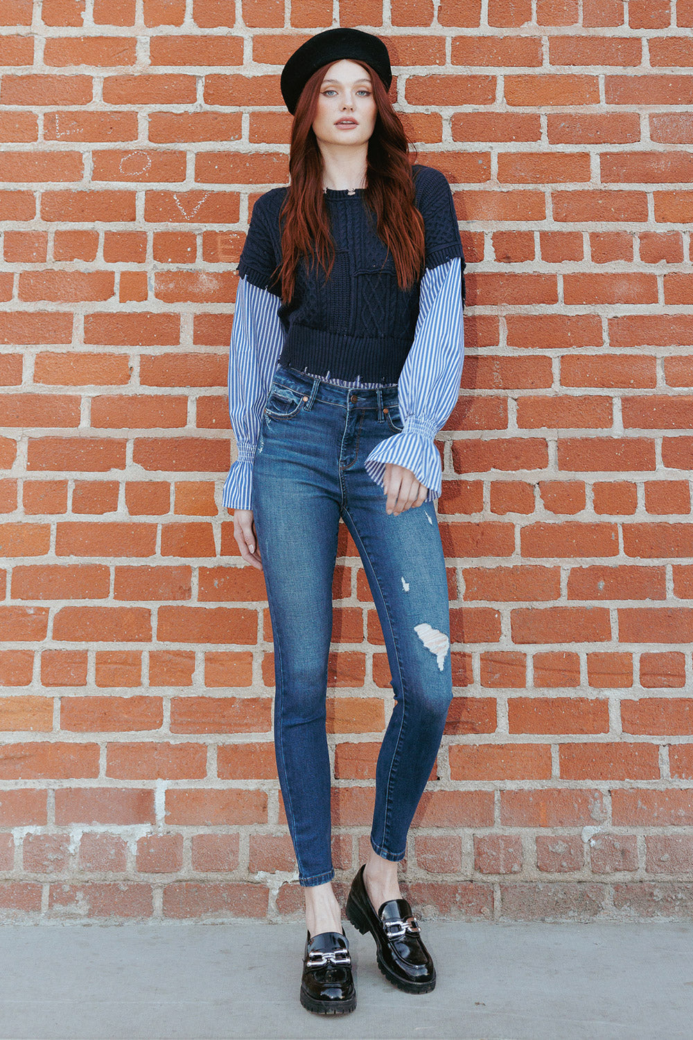 Women's dark blue skinny pants jeans with stylish rips, perfect for casual wear