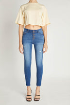 Women's blue skinny pants jeans with button detail for casual wear