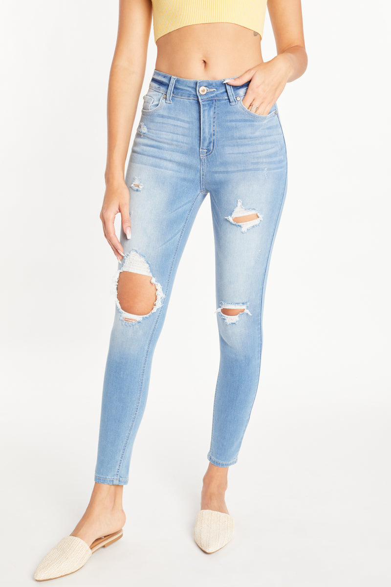 Women's light blue skinny pants jeans with distressed details for casual wear