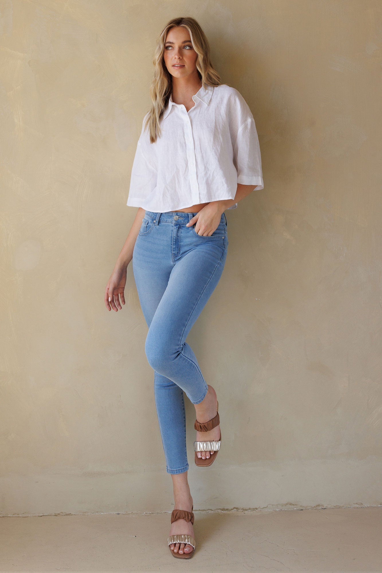 Women's light blue skinny pants jeans, casual outfit with white top