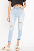 Women's light blue skinny pants jeans with distressed details for casual wear