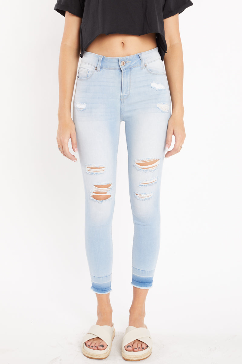 Women's light blue skinny pants jeans with distressed design for casual wear