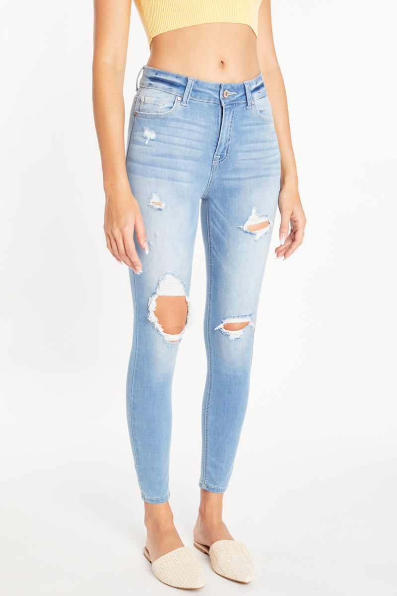 Women's light blue skinny pants jeans with distressed detailing