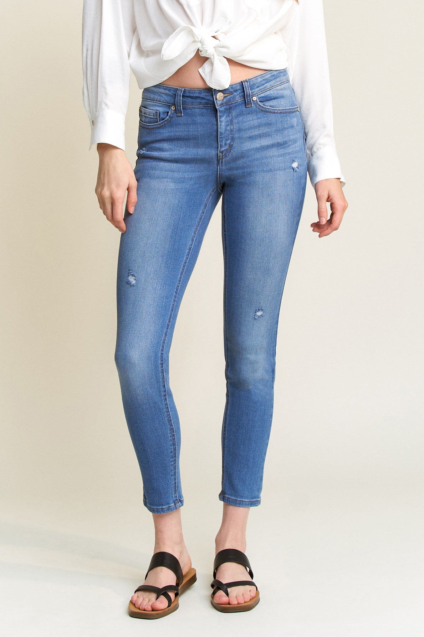 Women's blue skinny pants jeans with distressed detailing, casual wear