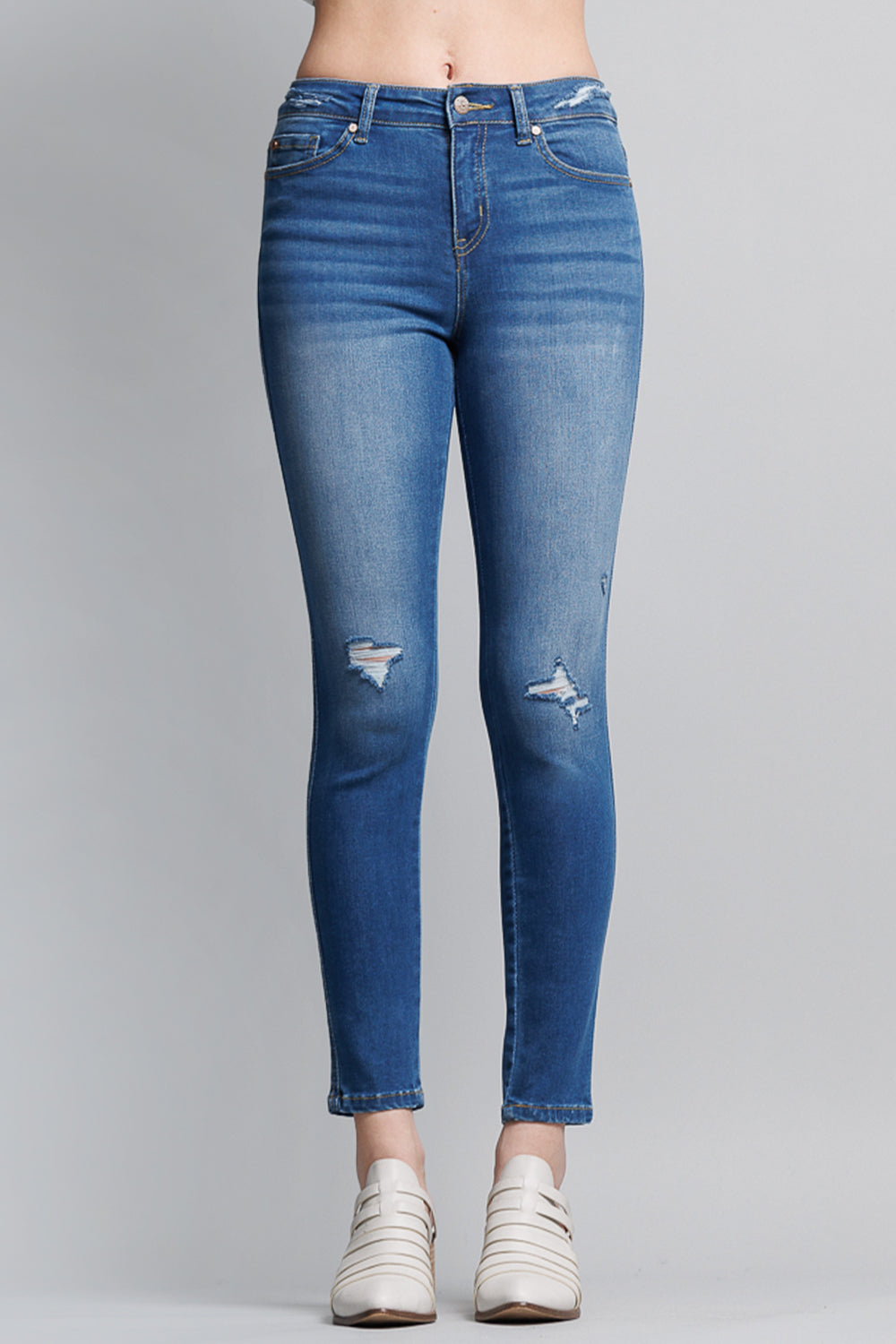 Women's blue skinny pants jeans with distressed details for casual wear