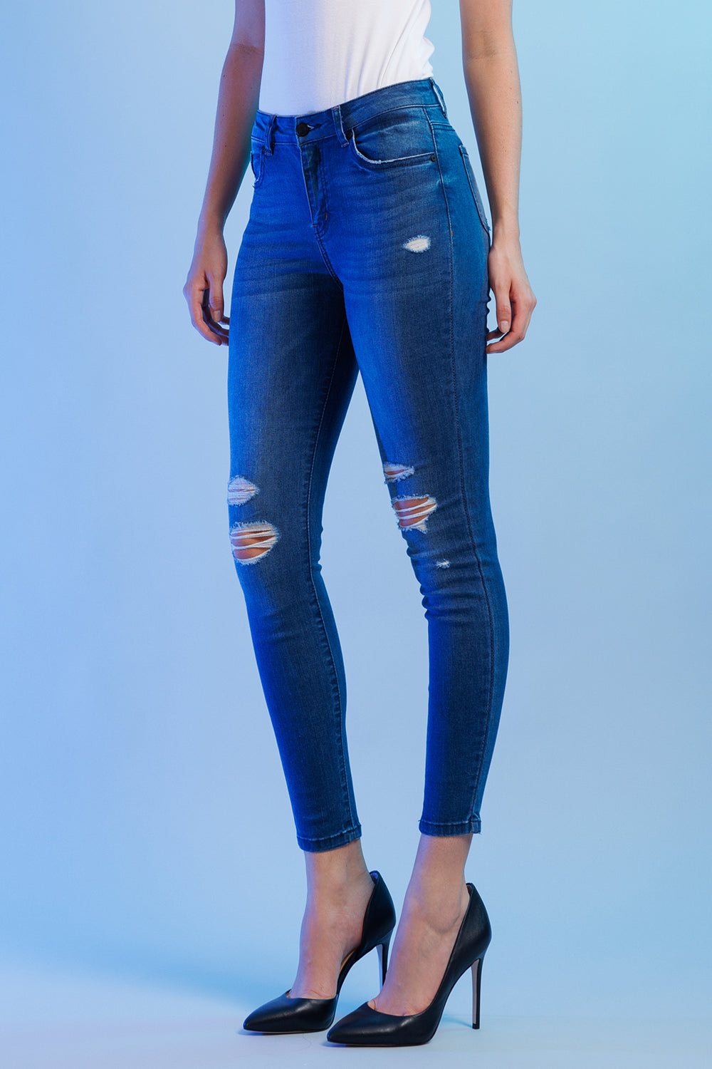 Women's blue skinny pants jeans with distressed detailing for casual wear
