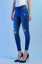 Women's blue skinny pants jeans with distressed detailing for casual wear