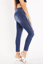 Women's blue skinny pants jeans with distressed detailing for casual wear
