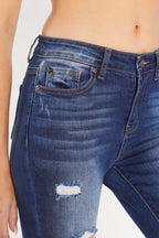 Women's blue skinny pants jeans with distressed details for everyday wear