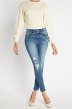 Women's blue skinny pants jeans with distressed details, great for casual outings