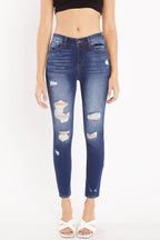 Women's distressed skinny pants jeans in dark blue denim for casual wear