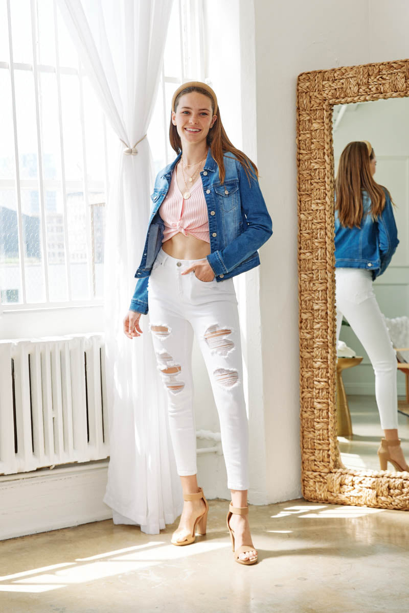 Women's white skinny pants jeans with distressed details for casual wear