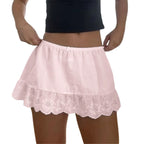 Women's pink mini skirt with lace trim for casual summer outings
