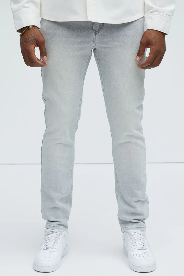 VacationGrabs slate grey jeans for men worn with white sneakers and a white shirt