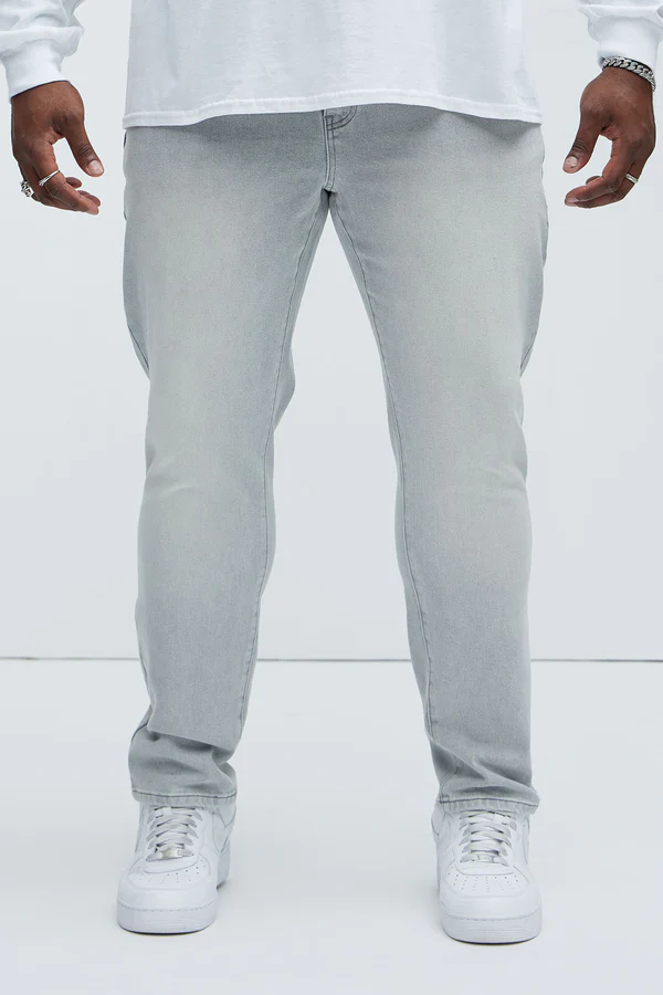 VacationGrabs slim fit slate grey jeans for men paired with white sneakers and shirt