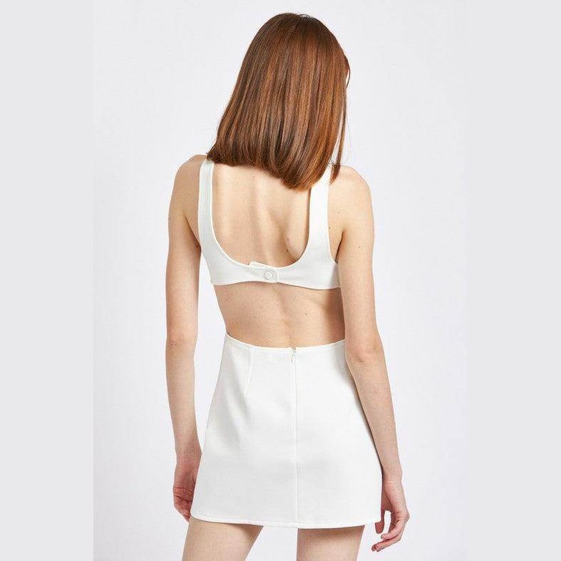 Back view of Emory Park white sleeveless mini dress for vacation with a stylish cutout design