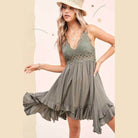La Miel sleeveless summer dress in olive green with lace detailing and ruffled hem for a stylish look