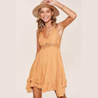 La Miel sleeveless summer dress in orange with lace detailing and ruffled hem for a stylish look