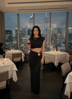 Women's black sleeveless top with cap shoulders, perfect for clubwear