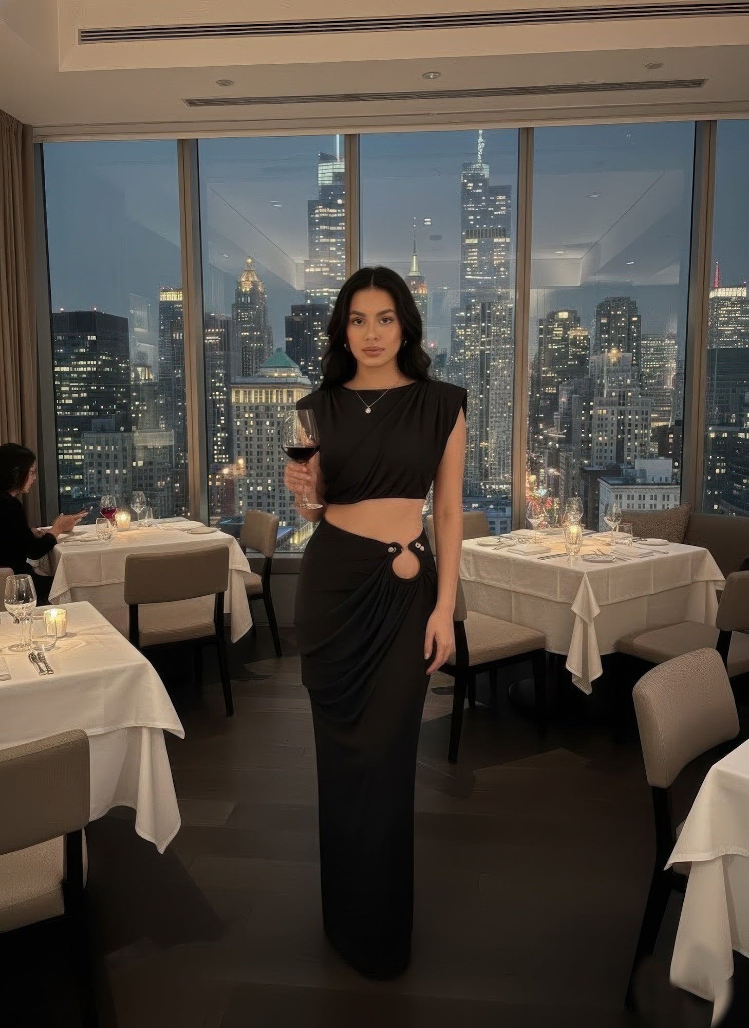 Women's black sleeveless top with cap shoulders, perfect for clubwear