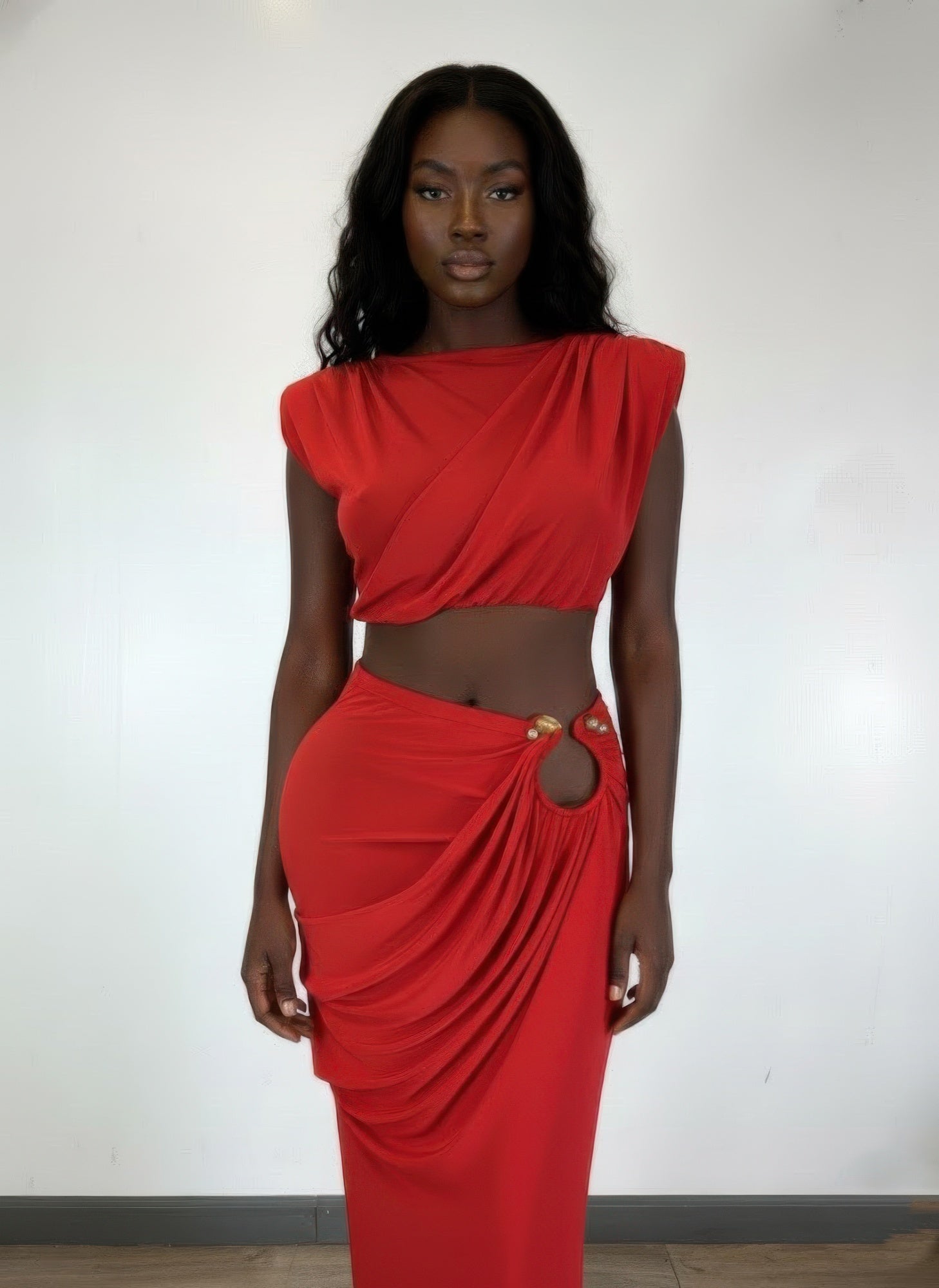 Red women's clubwear sleeveless top with cap shoulders and high-waisted skirt