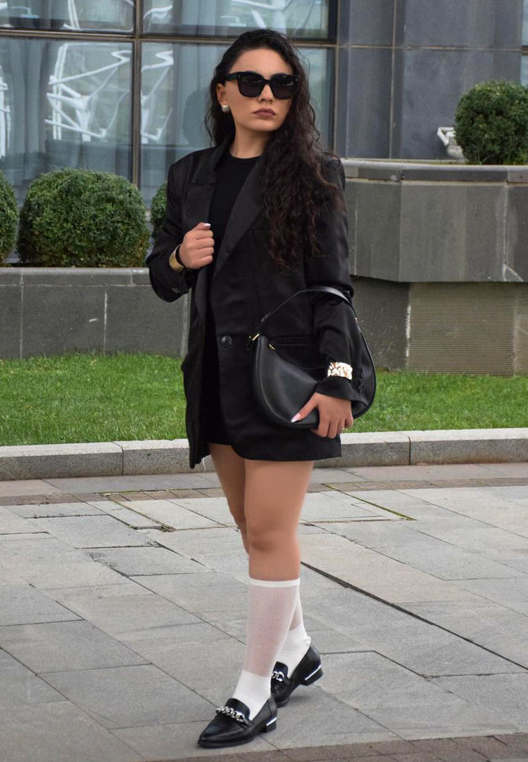 Women's black slip-on leather loafers for casual wear