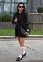 Women's black slip-on leather loafers for casual wear