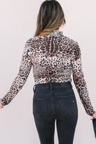 JUNIPER BLVD smocked neck long sleeve bodysuit in leopard print design, perfect for stylish layering