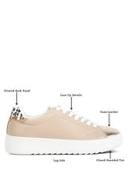 women's beige faux leather sneakers with lace-up details and printed back panel