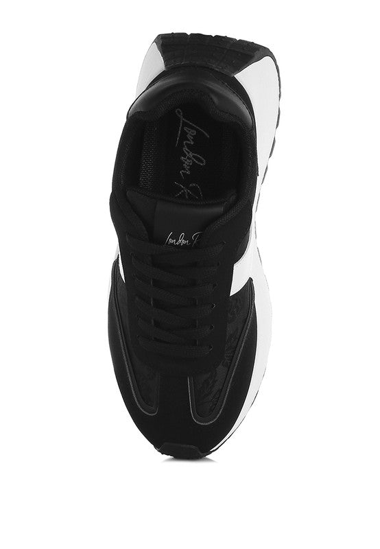 Women's black and white sneakers by Rag Company, stylish and comfortable for daily wear