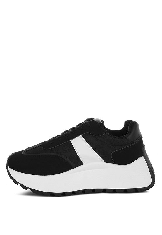 Women's black sneakers with white accents, ideal for casual wear