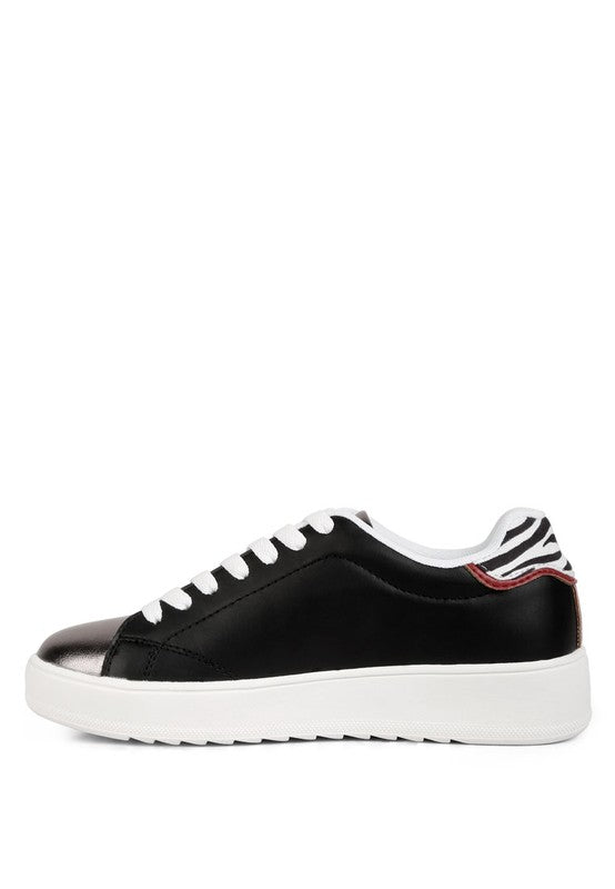 Women's black sneakers with shiny toe, perfect for casual wear